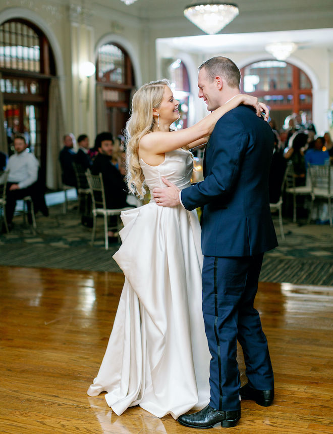 The bride and groom dancing.