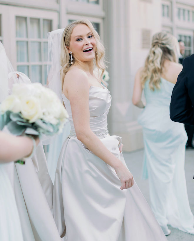 The bride looking back and smiling. 