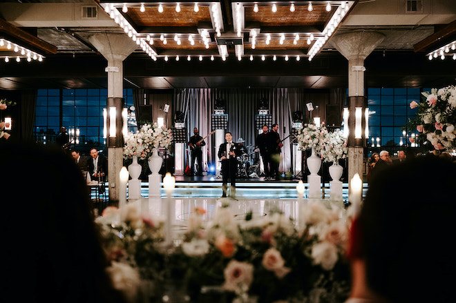 A toast during a wedding reception at houston heights wedding venue The Astorian