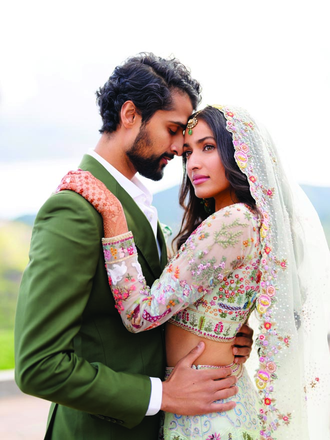 The bride and groom celebrate their interfaith wedding with a destination wedding in Malibu.