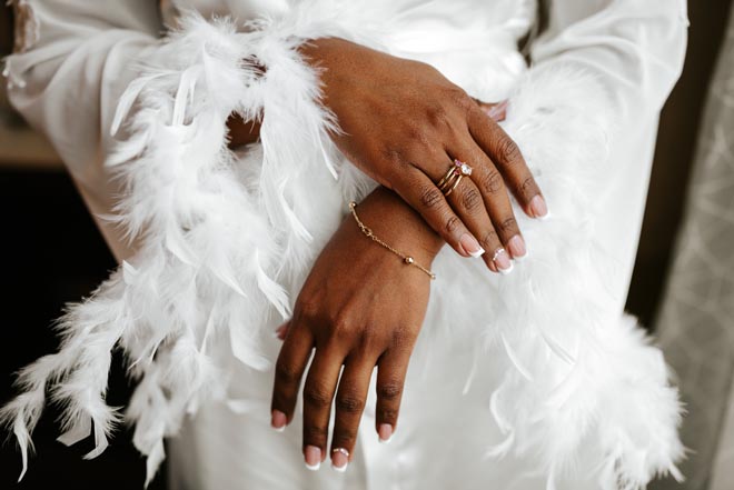 Nicole Johanna Photography captures a picture of the bride's jewelry.