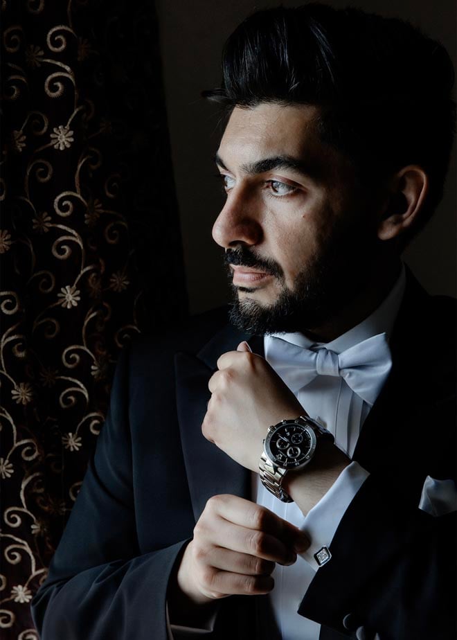 The groom gets ready for his Persian wedding ceremony at the Sans Souci Ballroom. 