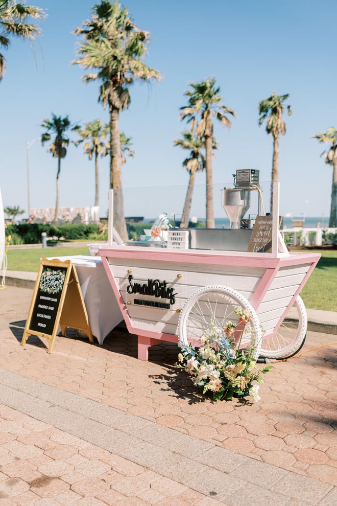 Small bites are served at the couple's outdoor wedding ceremony at the Grand Galvez.