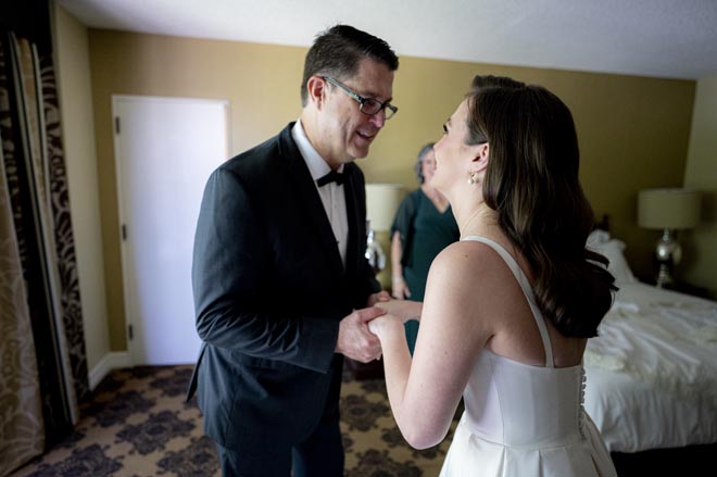 The bride and her father share a first look before the church ceremony. 