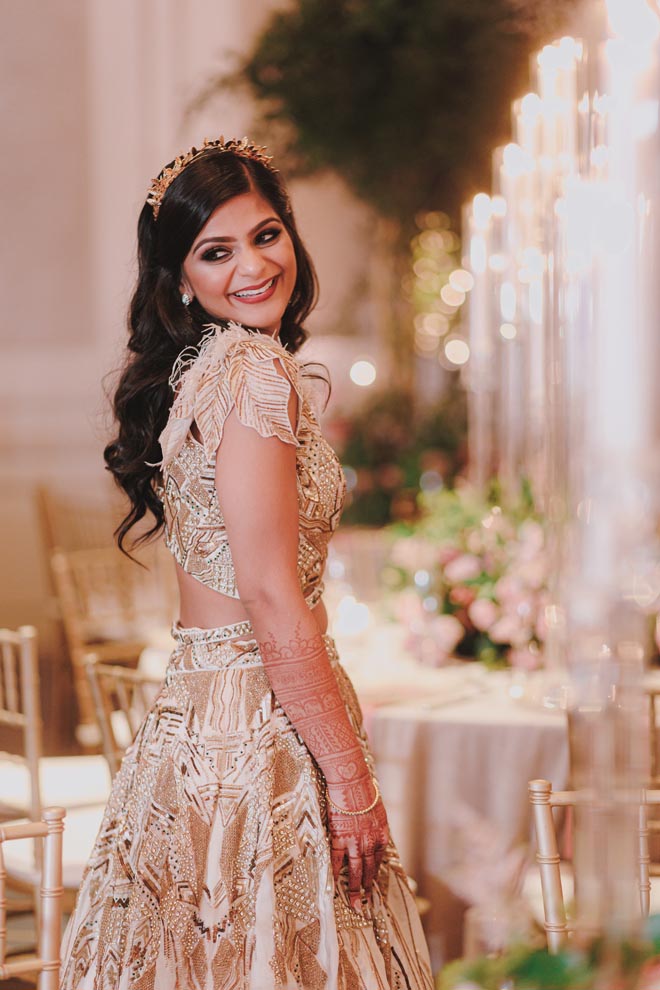 The bride smiles at her ballroom reception at The Westin Galleria Houston.