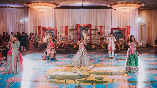 The bride dances at her Sangeet in Houston.