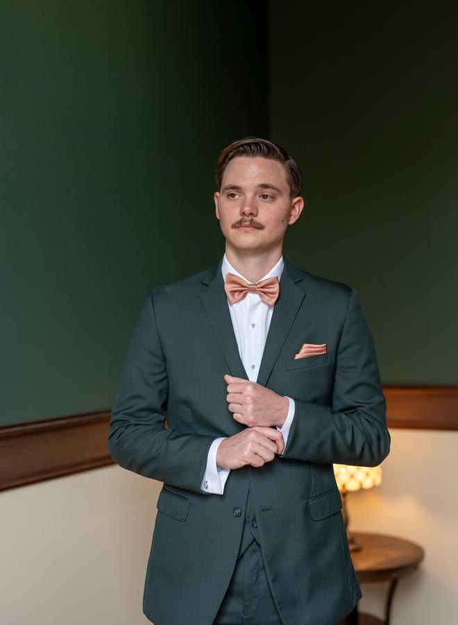 The groom gets ready for his intimate wedding celebration at Saint Arnold Brewery in Houston.