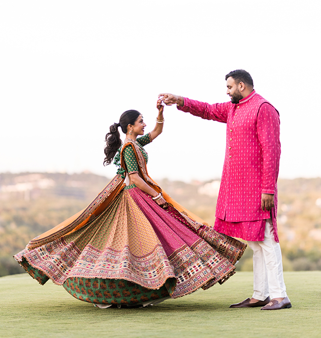 Bride and groom dancing on the lawn of Omni Barton Creek Resort & Spa in the Austin hill country. 