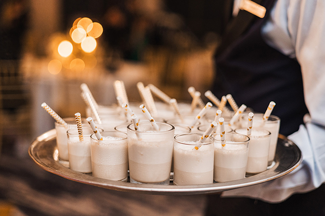 Milk shake shooters go around the ballroom for a late-night snack for guests. 