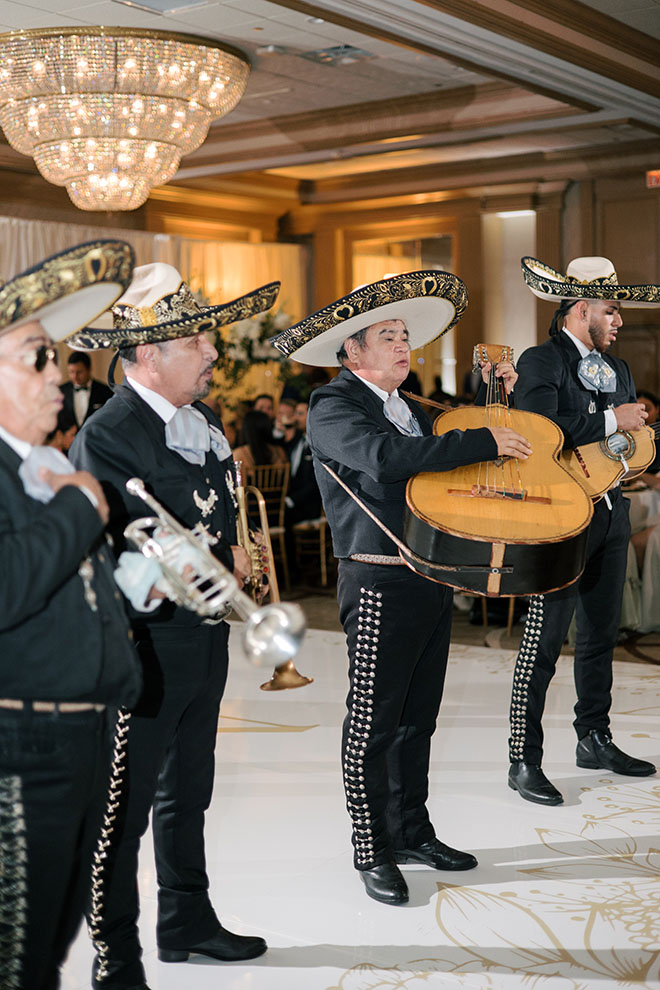 A mariachi band plays at the beachside wedding in Galveston.