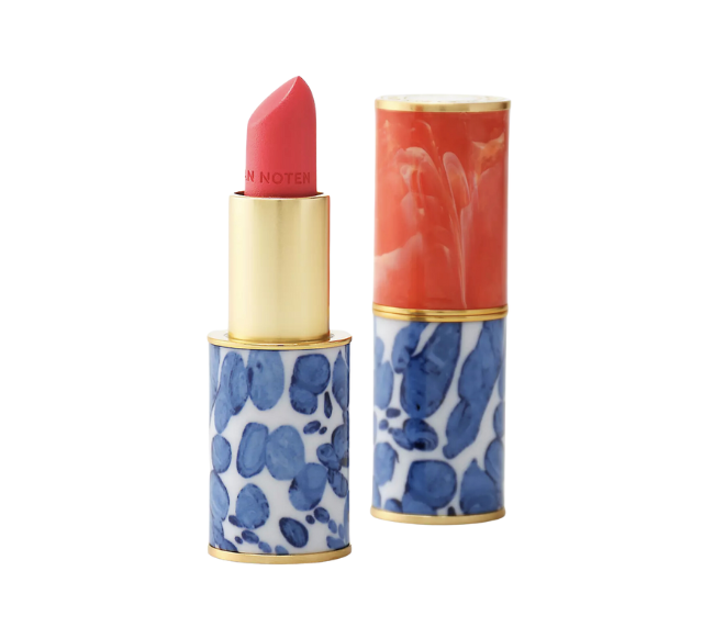 Dries Van Noten's refillable lipstick is a shade of pink and red. 