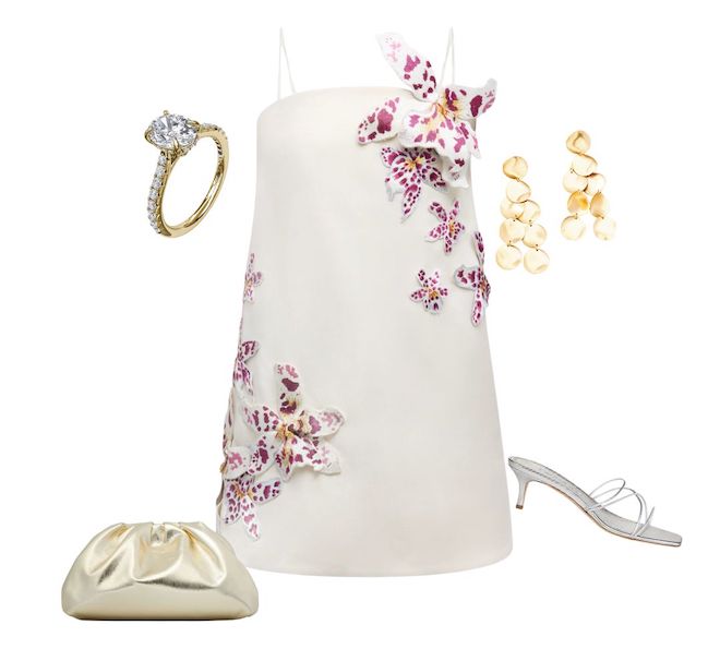 White mini-dress with orchid flowers paired with silver heels, gold clutch, gold engagement ring and gold dangle earrings. 