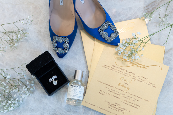 Yellow stationery for the Sangeet, blue shoes, a ring box and a perfume. 